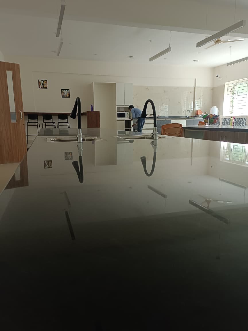 Technician performing floor treatment in a commercial space